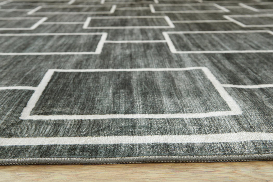 Elderland Washable 7'6" x 9'6" Area Rug - LasVegasFurnitureOnline.com