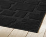 Gibbswell Washable 8' x 10' Area Rug - LasVegasFurnitureOnline.com