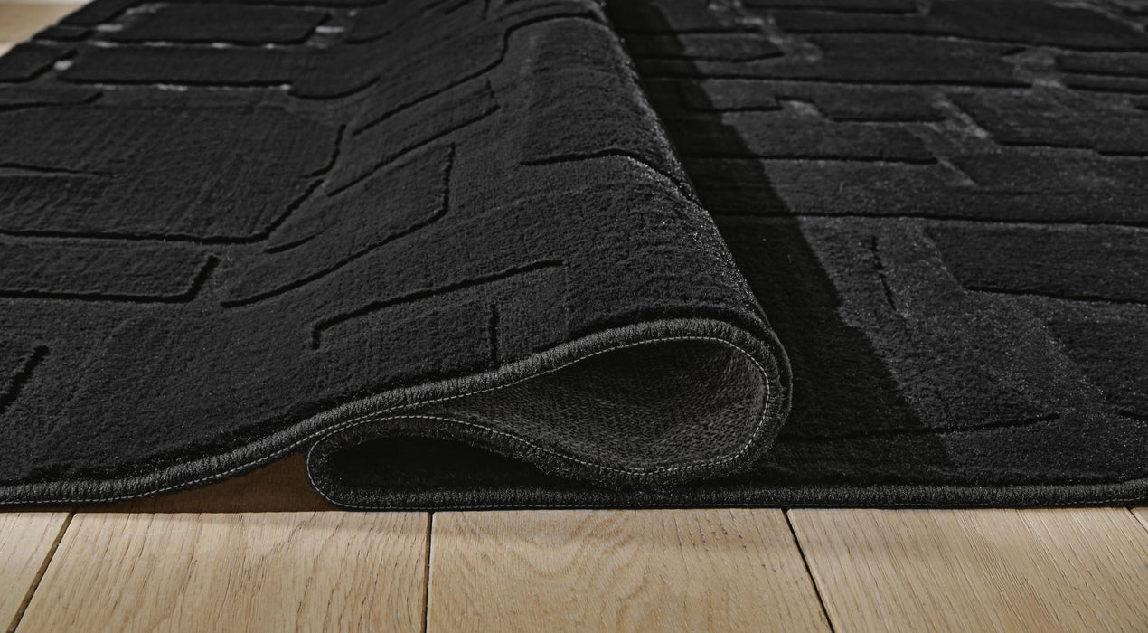 Gibbswell Washable 8' x 10' Area Rug - LasVegasFurnitureOnline.com