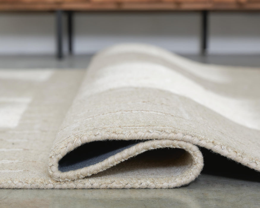 Wolbert 7'8" x 10' Area Rug - LasVegasFurnitureOnline.com